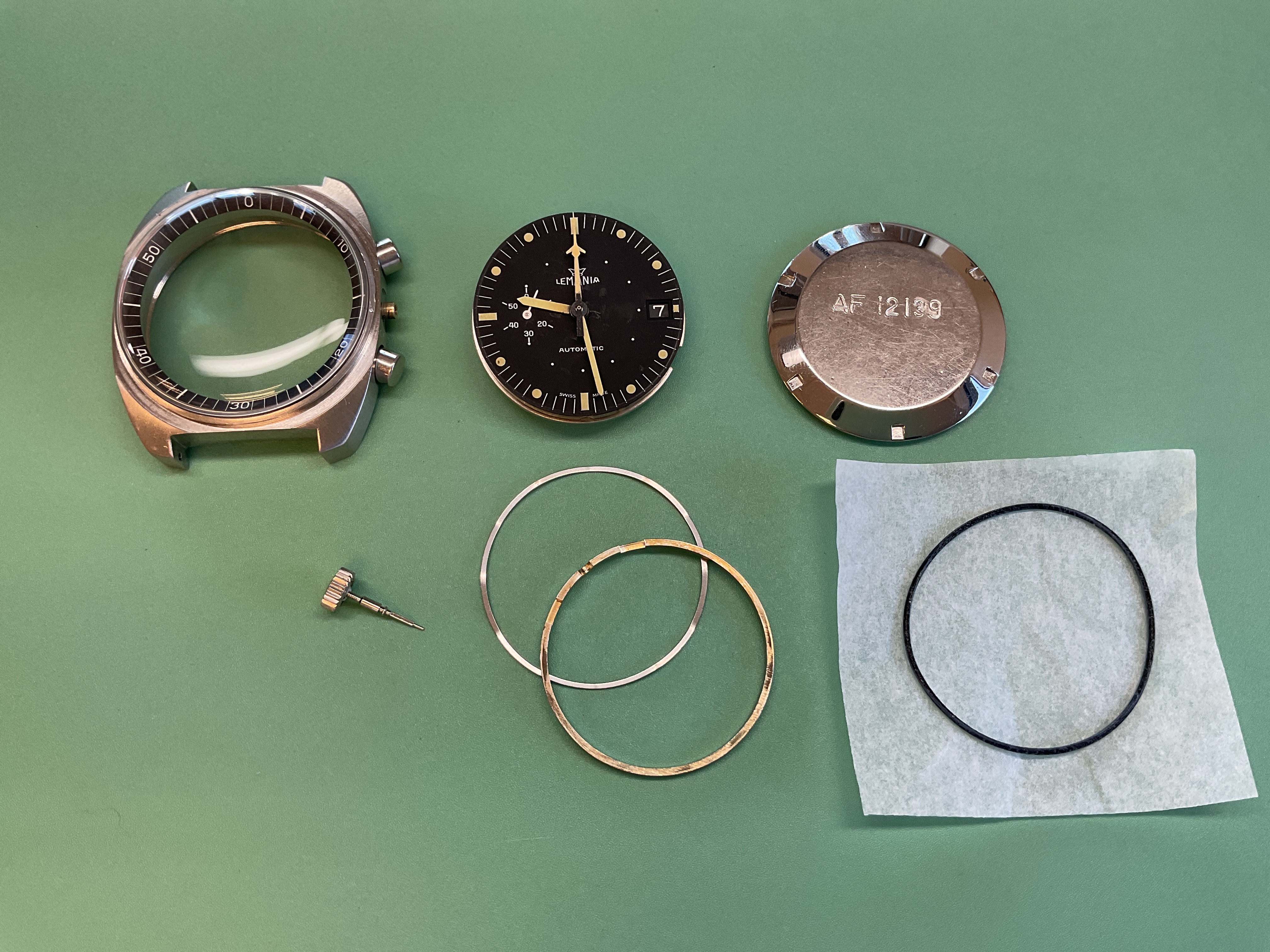 The dial, case, and inner caseback — engraved 