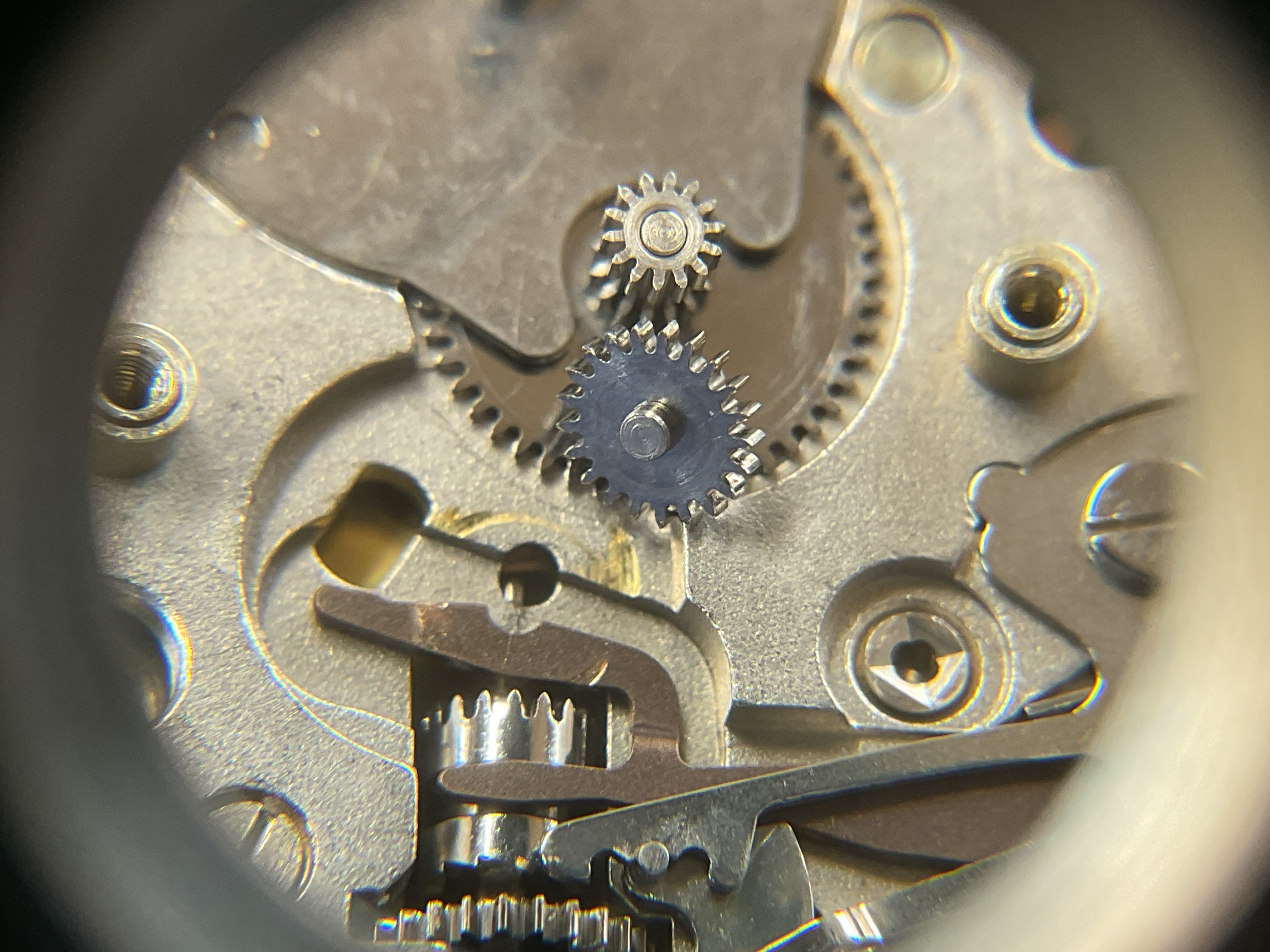 The calendar setting works, where a burred pinion had scored the mainplate and yoke.